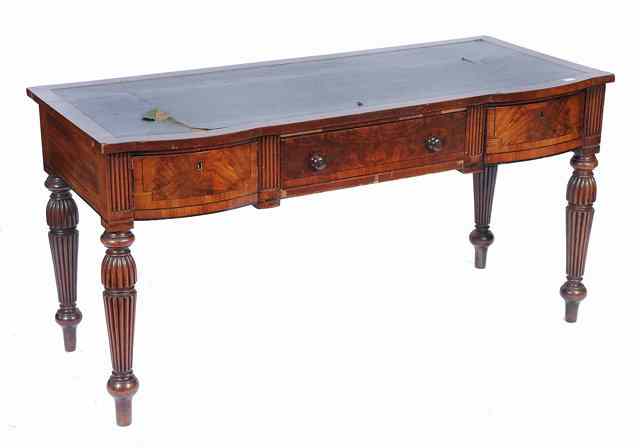 Appraisal: A WILLIAM IV MAHOGANY WRITING TABLE fitted one long central