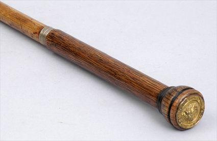 Appraisal: ENGLISH SILVER-MOUNTED OAK AND BAMBOO WALKING STICK The screw-off cap