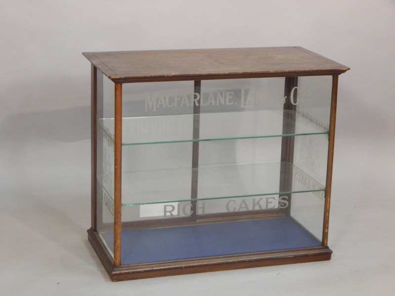 Appraisal: A late thC early thC mahogany and glazed shop display