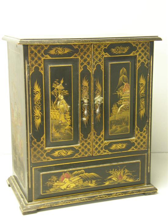 Appraisal: Early twentieth century Japanese lacquered desk top cabinet highlighted in