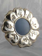 Appraisal: An Italian Florence sterling silver cicular photo frame formed as