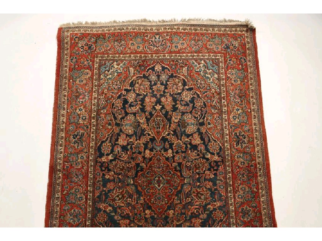 Appraisal: A PERSIAN RUG of Tabriz type with a central dark