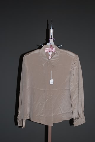 Appraisal: Giorgio Armani silk long sleeve blouse plain front placket hidden