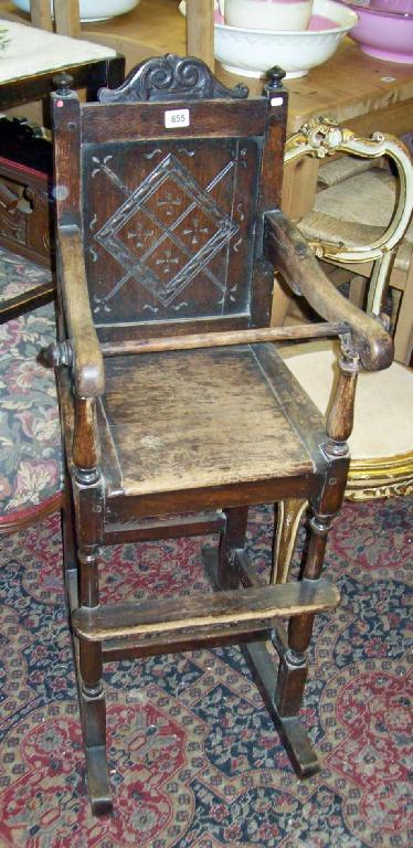 Appraisal: A Charles II design oak child's high chair -