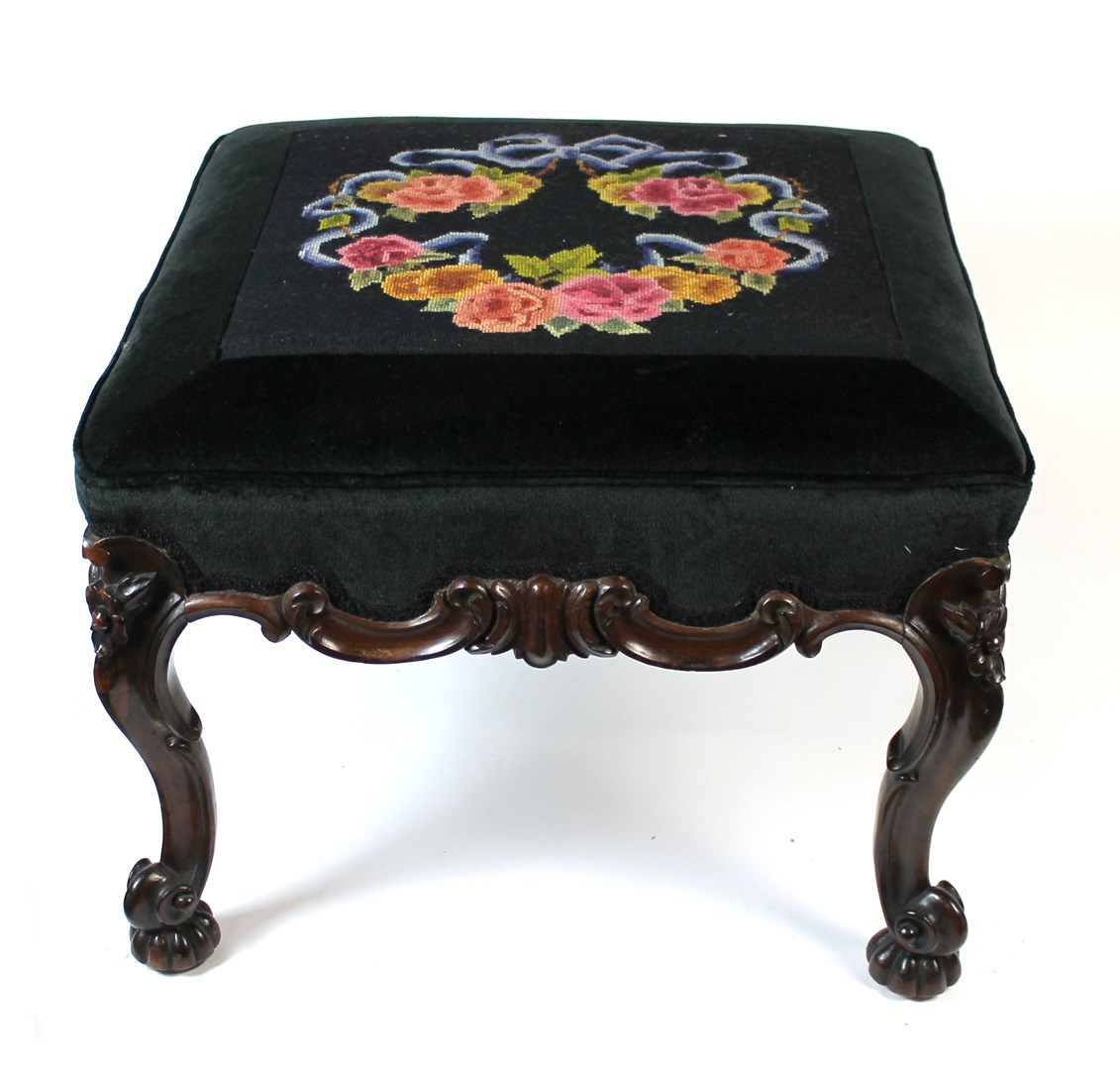 Appraisal: A th century mahogany footstool the square overstuffed top over