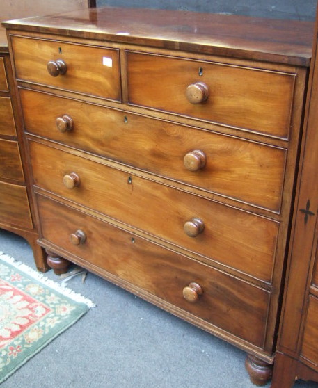 Appraisal: A Victorian mahogany chest of two short and three long