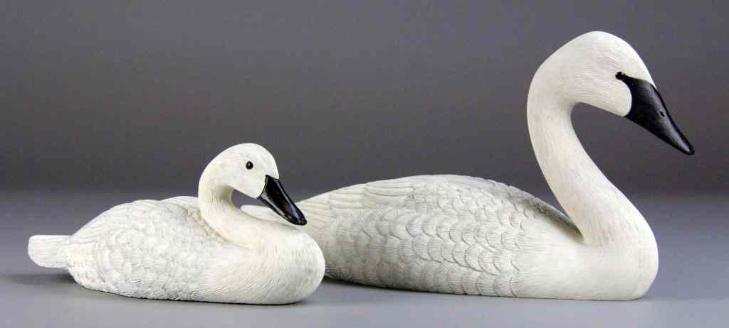 Appraisal: Bud Wheeler Finely Carved Swan CygnetFinely executed wood-carvings by Bud