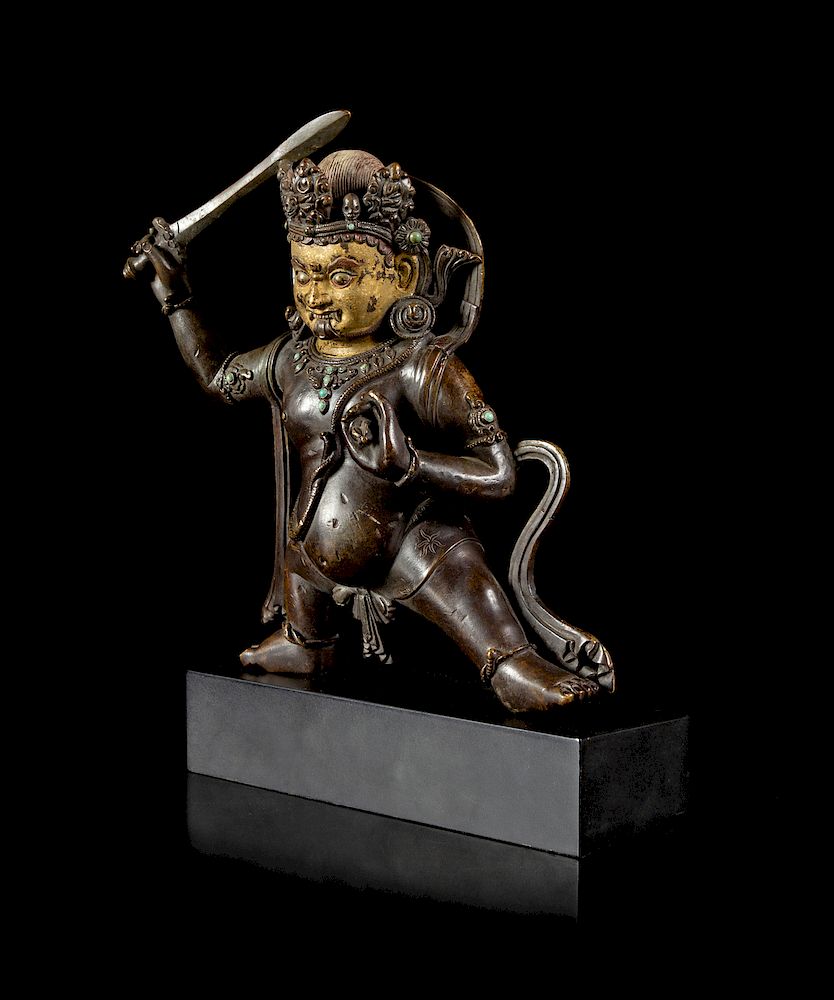 Appraisal: A Sino-Tibetan Parcel-Gilt Bronze Figure of Jambhala Figure height in