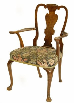 Appraisal: A walnut open armchair in George I style with a