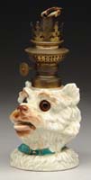 Appraisal: PORCELAIN FIGURAL LAMP H - Porcelain terrier finger lamp with