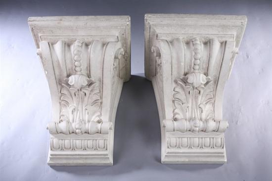 Appraisal: PAIR COMPOSITION ARCHITECTURAL CORBEL BRACKETS th century Molded plinth tops