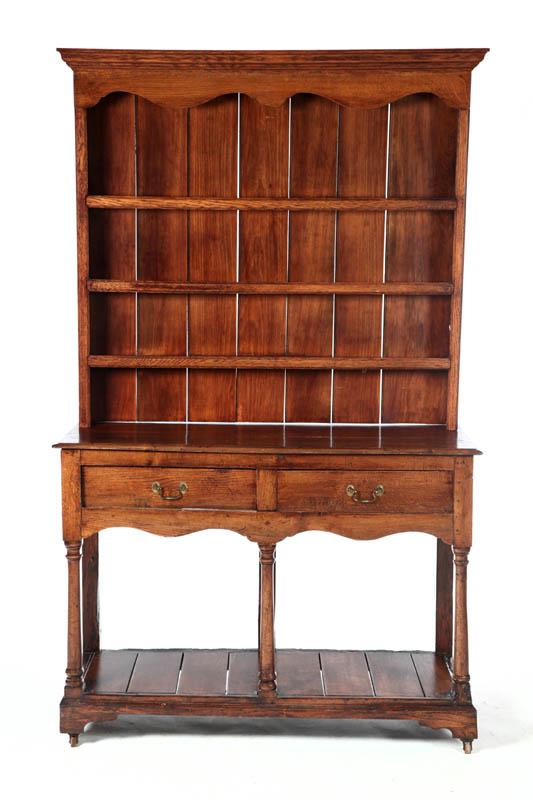 Appraisal: WELSH DRESSER England th century oak Two-piece the upper section