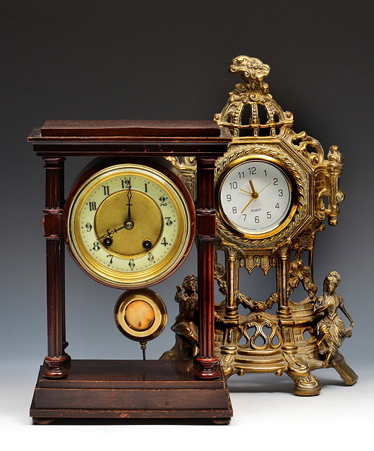 Appraisal: A Hamburg American portico mantel clockthe two piece dial with