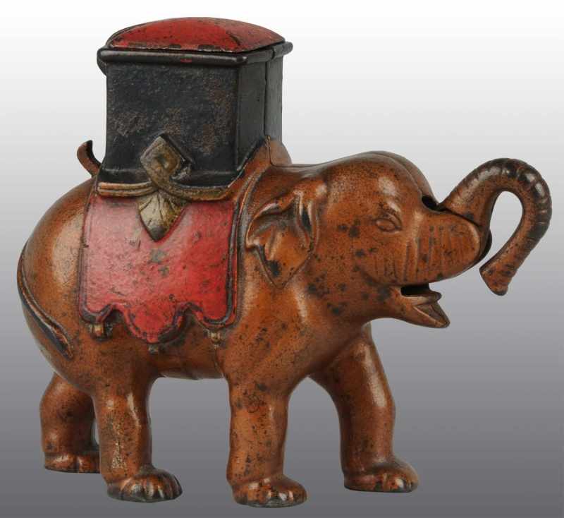 Appraisal: Cast Iron Elephant Man Pops Out Mechanical Bank Description Circa