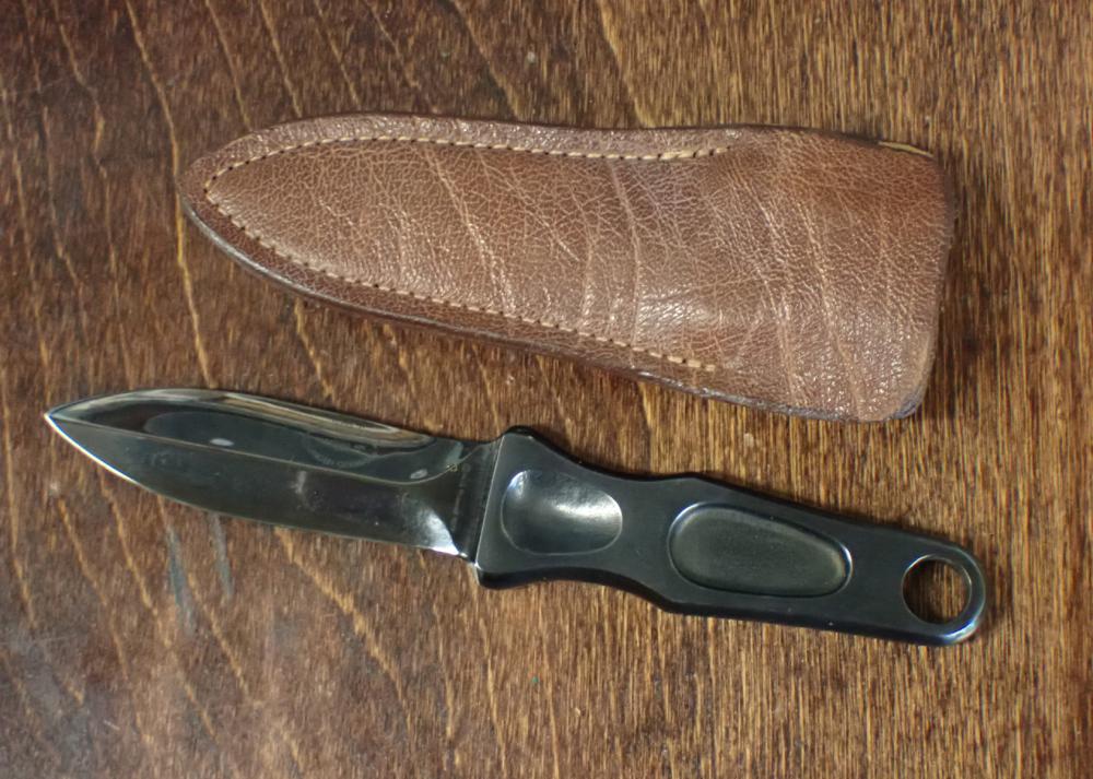 Appraisal: A G RUSSELL BOOT DAGGER having hollow ground double edge