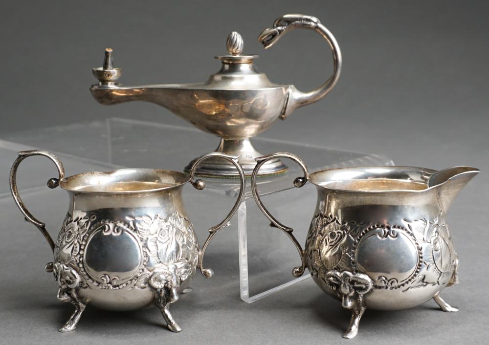 Appraisal: AMERICAN REPOUSSE STERLING SILVER CREAMER AND SUGAR AND AN ENGLISH