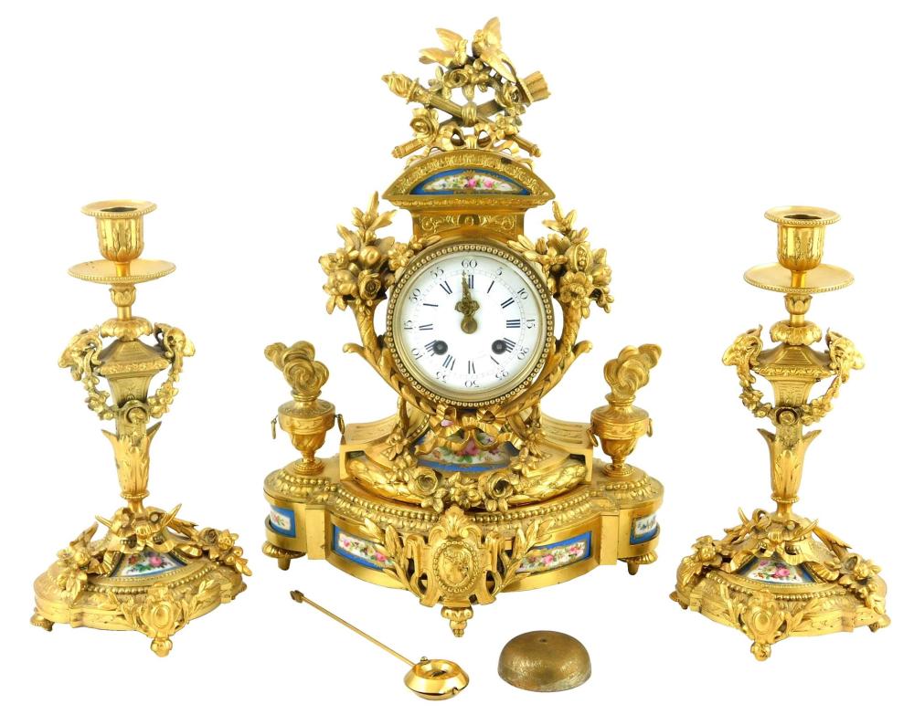 Appraisal: th C French mantel clock and candlestick suite by Vincenti