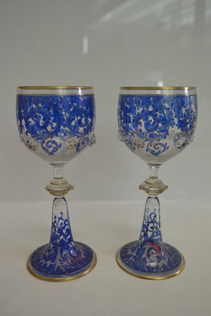 Appraisal: A PAIR OF HAND PAINTED WINE GOBLETS WITH APPLIED PRINTS