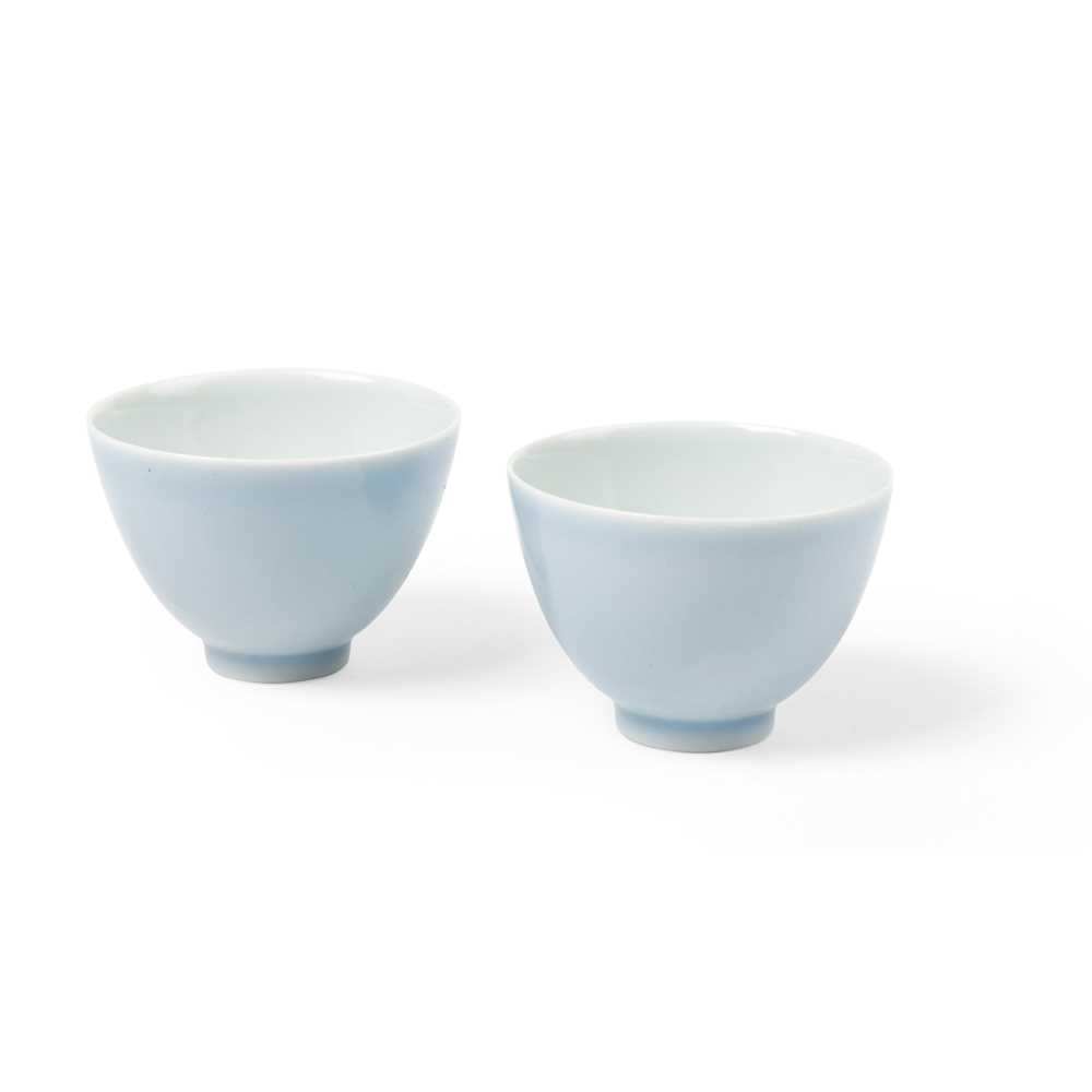 Appraisal: PAIR OF SKY-BLUE-GLAZED CUPS QING DYNASTY YONGZHENG MARK TH CENTURY