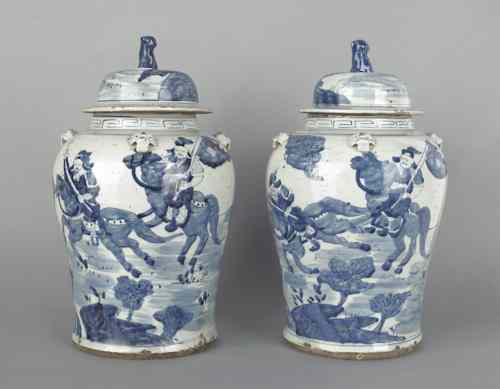 Appraisal: Pair of Chinese export blue and white baluster form urns