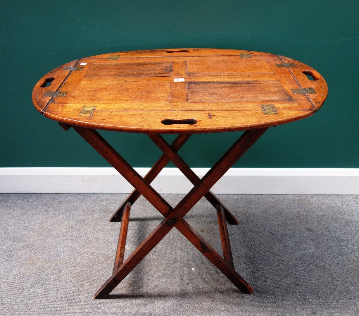 Appraisal: An early th century mahogany drop flap butler's tray with