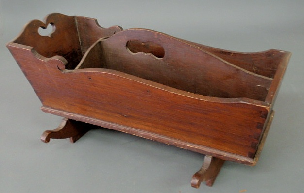 Appraisal: Pennsylvania walnut doll cradle converted to a cutlery box form