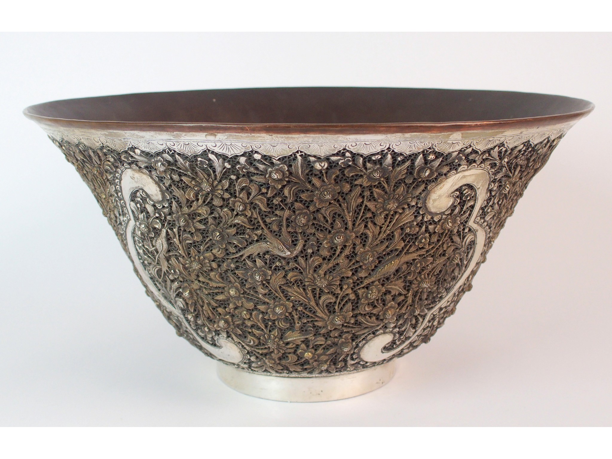 Appraisal: A Chinese white metal filigree bowldecorated with birds and scrolling