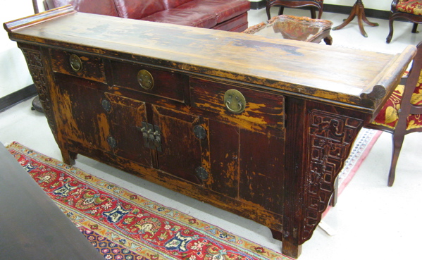 Appraisal: LONG CHINESE ALTAR CABINET the top having bird's tail end