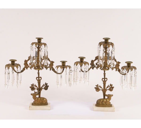 Appraisal: Pair gilt metal candelabra with glass prism and deer molded