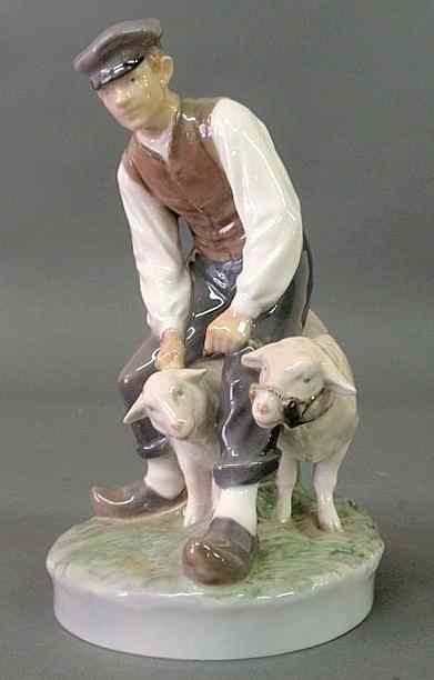 Appraisal: Royal Copenhagen figural group of a young farm boy with