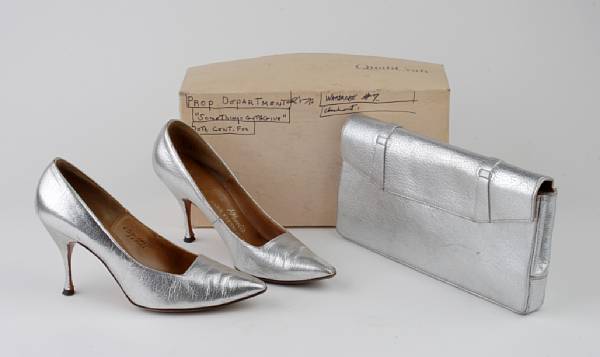 Appraisal: A Marilyn Monroe pair of silver high heels and matching