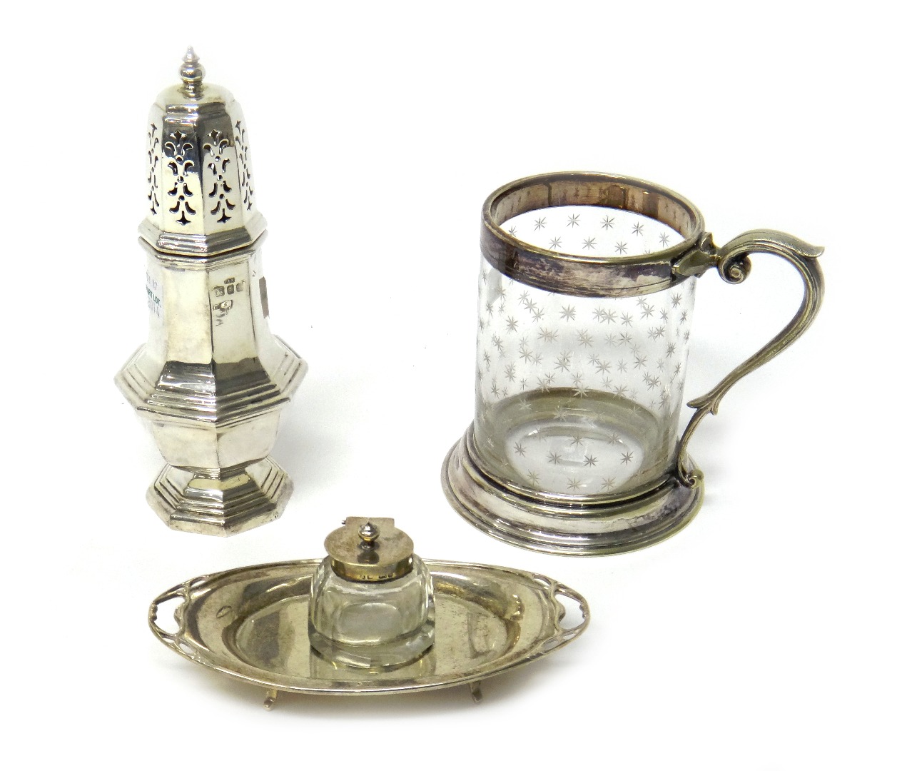 Appraisal: A silver octagonal baluster shaped sugar caster London a silver