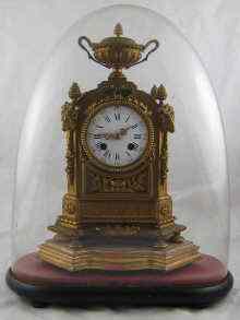 Appraisal: A gilt metal French eight day striking clock with enamel