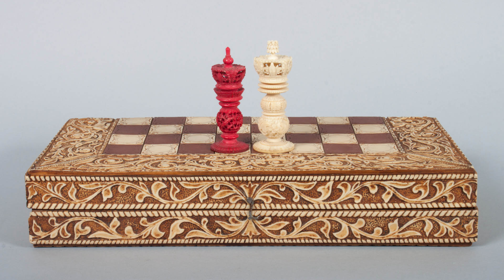 Appraisal: Chinese carved ivory chess set white and dyed red carved