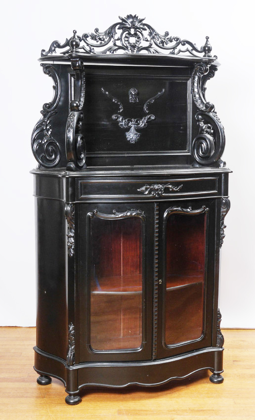 Appraisal: ROCOCO STYLE FRENCH EBONIZED CABINET Carved and pierced foliate crest