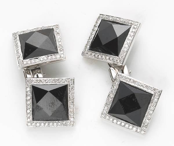 Appraisal: A pair of black onyx diamond and k white gold