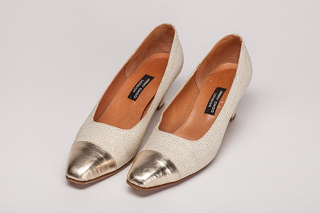 Appraisal: A s pair of cream Jimmy Choo court shoes with