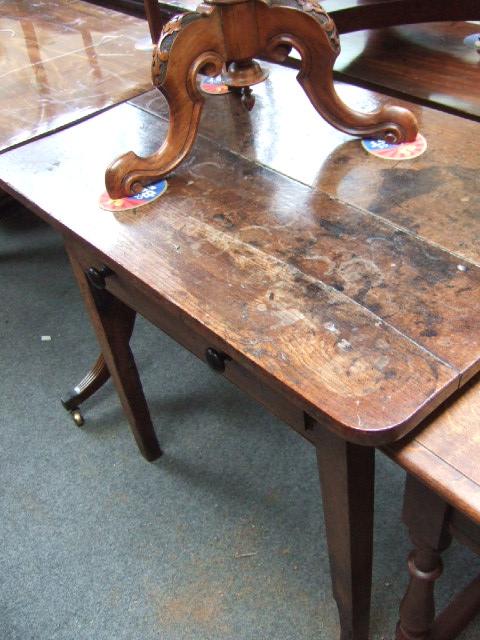 Appraisal: A George III side table the double plank top over