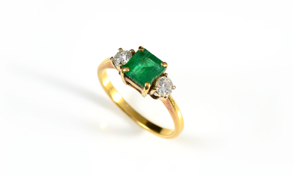 Appraisal: K EMERALD AND DIAMOND RING K yellow gold emerald ring