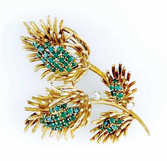 Appraisal: Emerald and diamond flower-form brooch four spiked blossoms set with