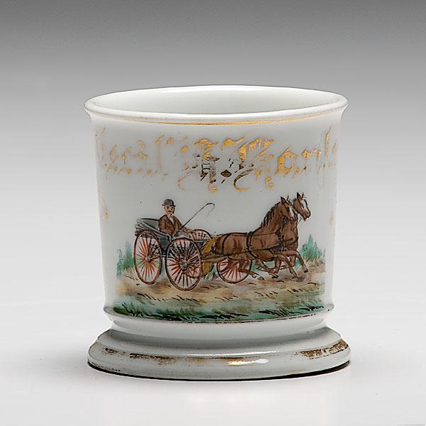 Appraisal: HORSE-DRAWN BUGGY OCCUPATIONAL SHAVING MUG porcelain with polychrome painted scene