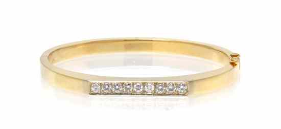 Appraisal: A Karat Yellow Gold and Diamond Bangle Bracelet containing nine