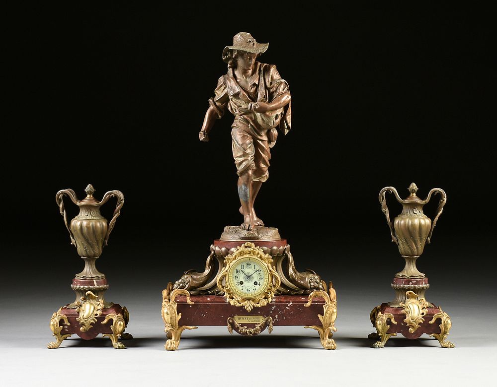 Appraisal: A THREE PIECE FRENCH PATINATED AND GILT SPELTER ON MARBLE