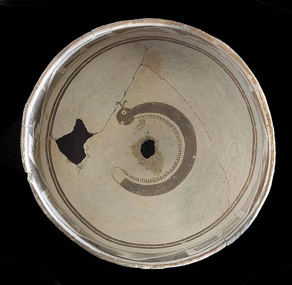 Appraisal: A Mimbres black-on-white bowl Showing a centipede curled around the