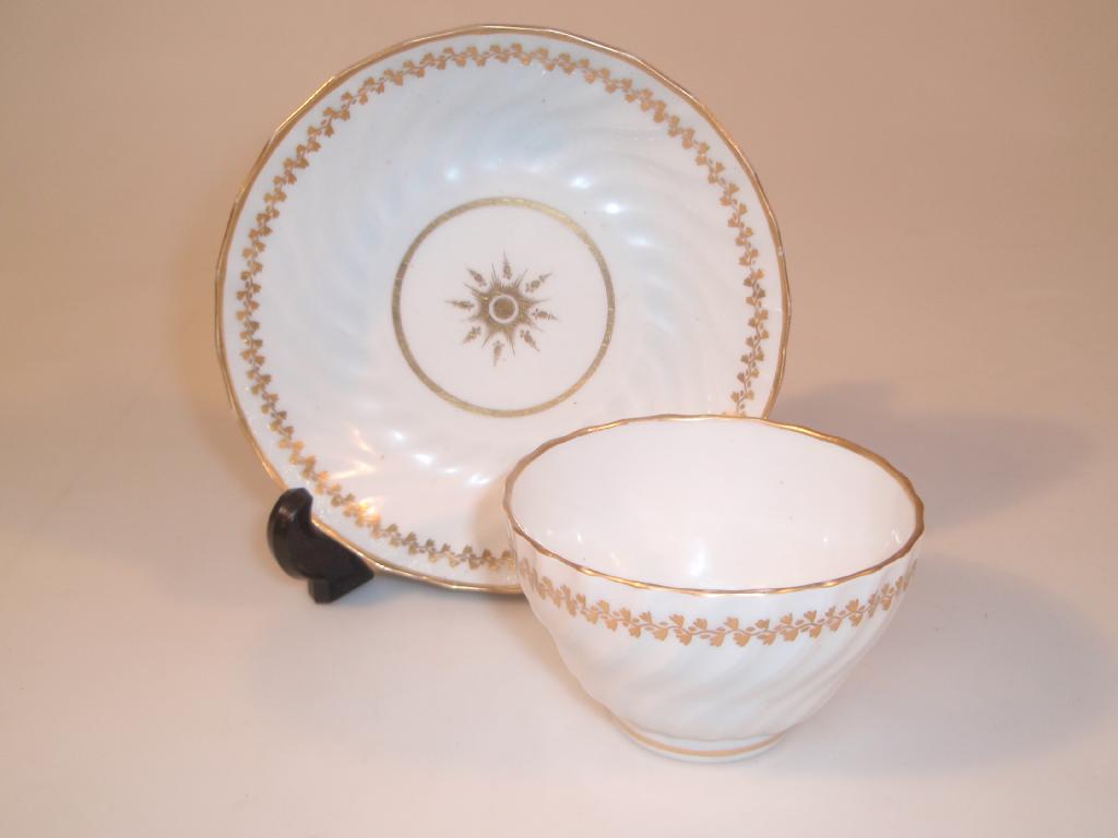 Appraisal: An thC Worcester porcelain tea bowl and saucer of writhen