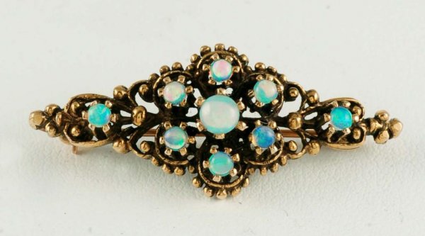 Appraisal: Yellow gold and opal brooch Marked K filigree set with