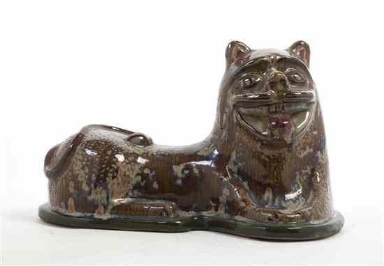 Appraisal: A Mexican Ceramic Lion Jorge Wilmot in a recumbent pose