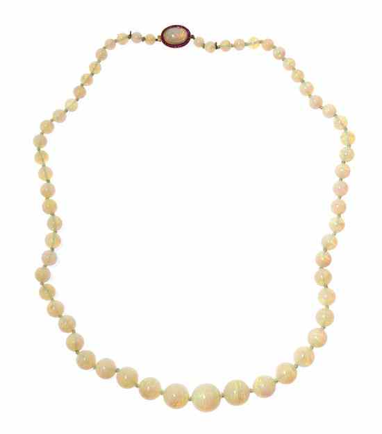 Appraisal: A Single Strand Graduated Opal Bead Necklace containing beads measuring