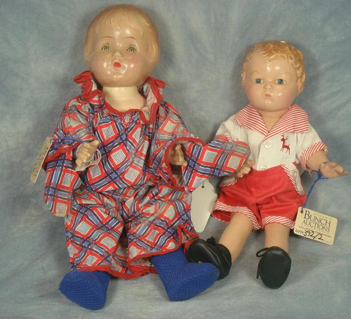 Appraisal: Two Composition Dolls the one in the red and white