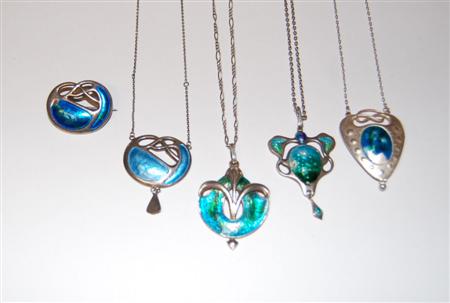 Appraisal: Four assorted enamelled necklaces and a matching brooch to include